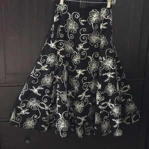 Mid-calf length empire skirt.